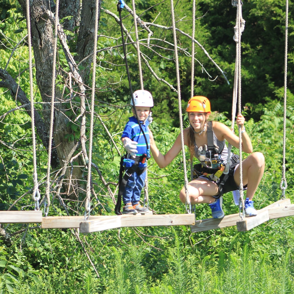 family navigating the obstacle course