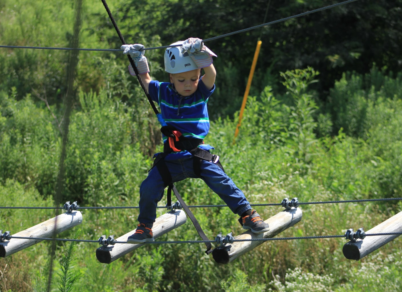 little boy navigating the obstacle course at the ark encounter