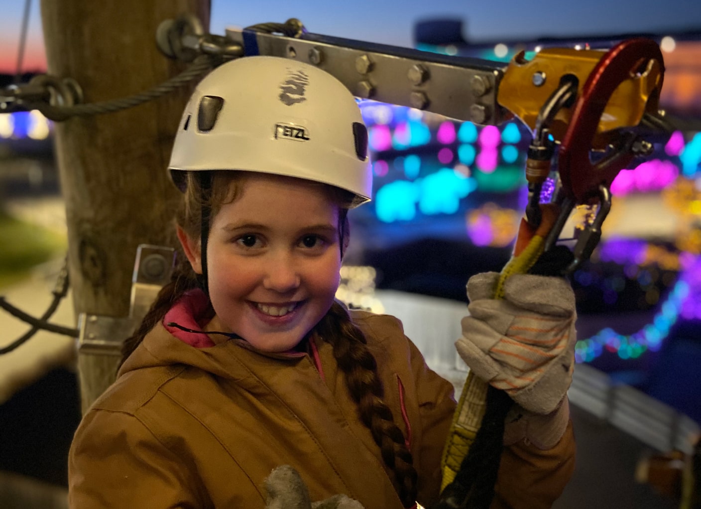 child on christmas time zip line