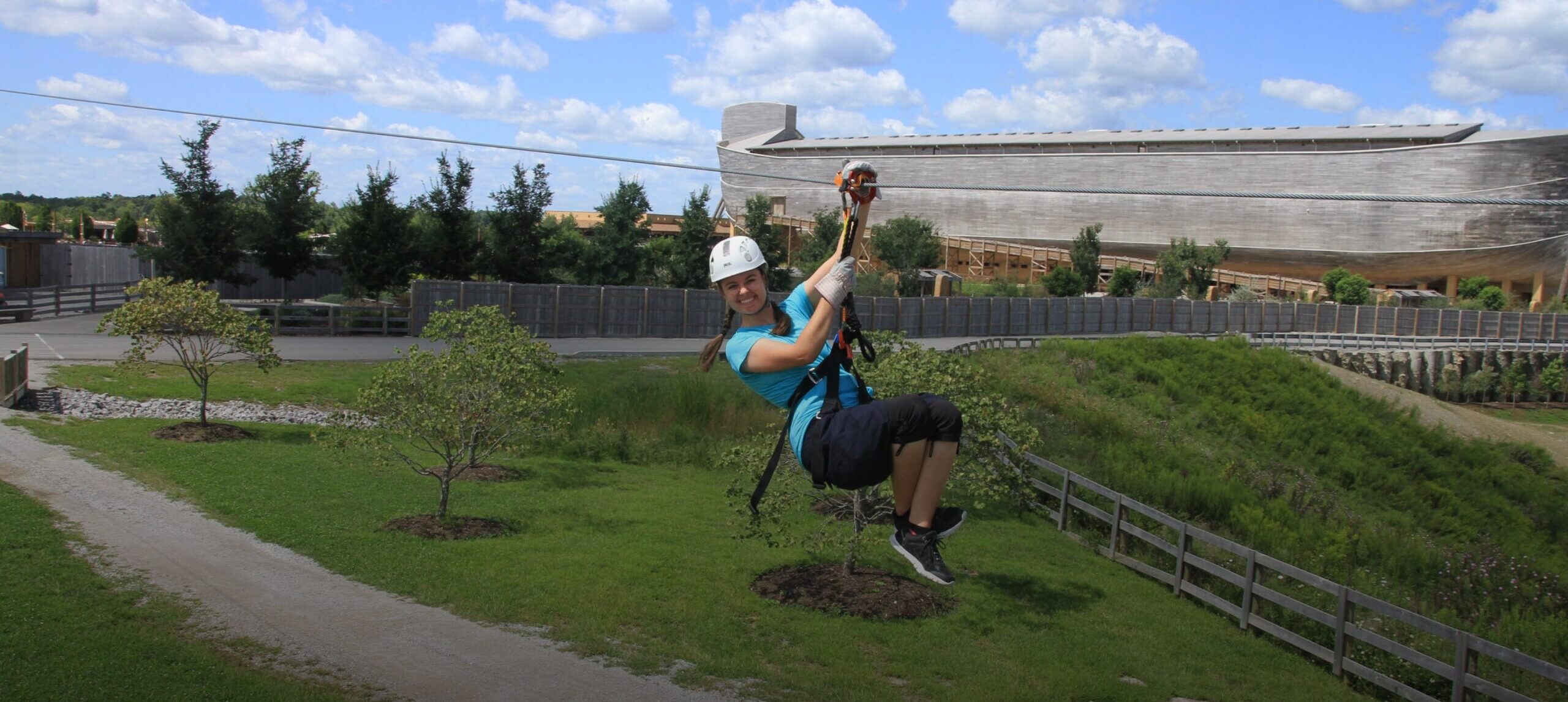 ziplining in kentucky with the ark encounter in the background